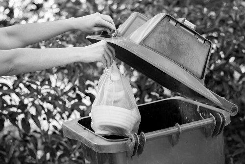 Clearance team organizing and sorting household items